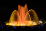 The colorful water show of Magic Fountain of Montjuic with light and music in Barcelona , Spain