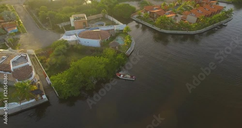 Drone view of a boat in the Higuerote canal's mangroves in Venezuelae photo