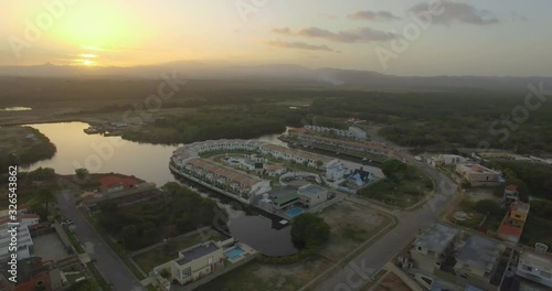 Aerial view of a sunset over Higuerote houses, in Venezuela photo