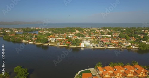 Drone over the Higuerote canals, in Venezuela during the golden hour photo