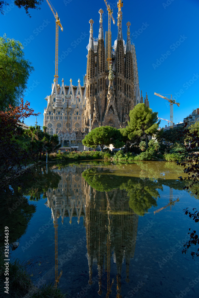 Reflection of Sagrada Familia, the cathedral designed by Gaudi in Barcelona, Spain Reflection of Sagrada Familia, the cathedral designed by Gaudi in Barcelona, Spain
