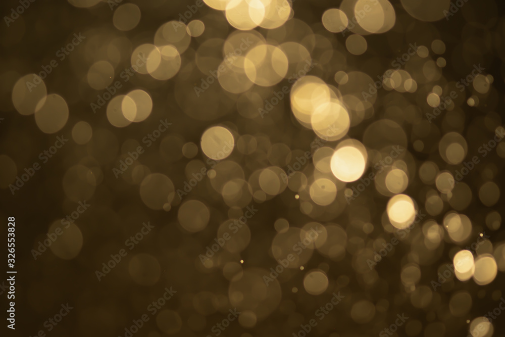 Fototapeta premium Golden glitter bokeh of light.Abstract blurred light