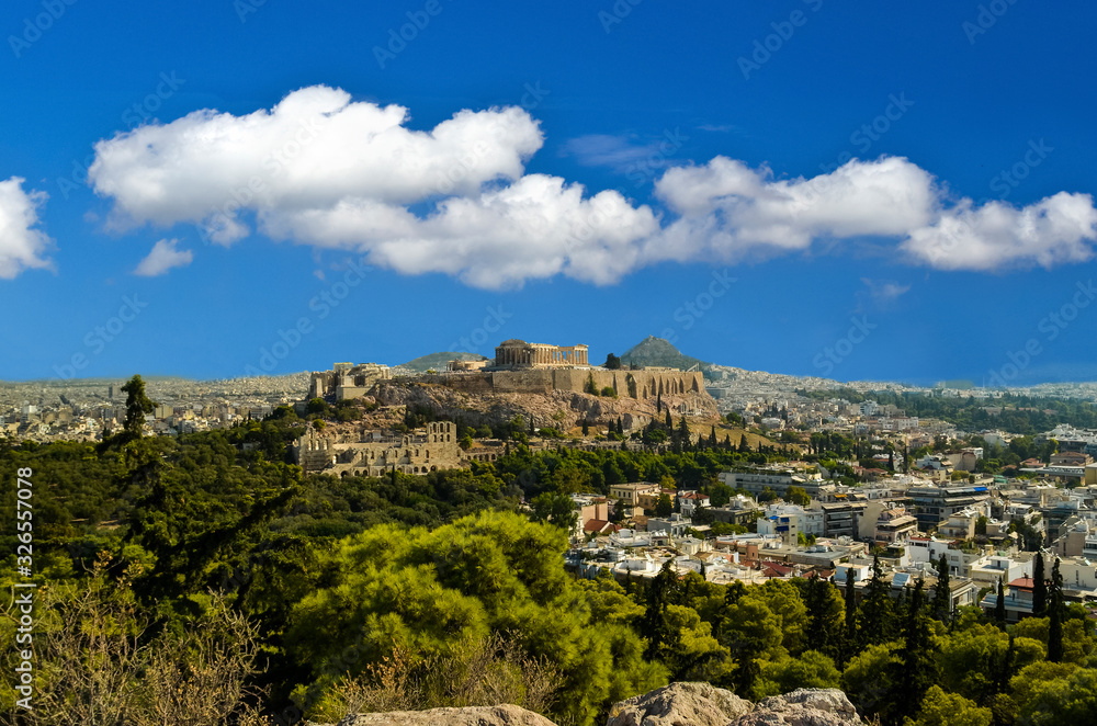 parthenon in athens  city greece in spring  season green pines blue sky and clouds