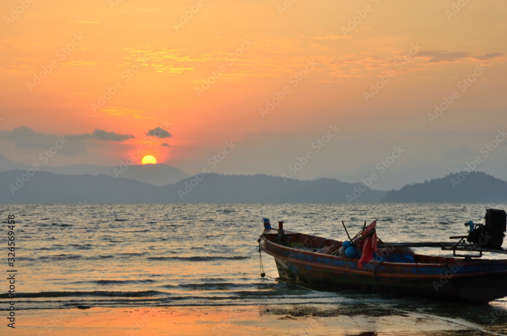 Sunrise boat beach Ko Phayam in Ranong province;Thailand 