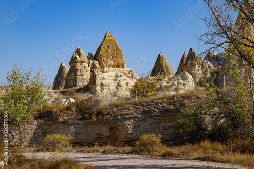 Rock formations of mountain ridges, valleys and pinnacles at Göreme National Park, Cappadocia, Turkey