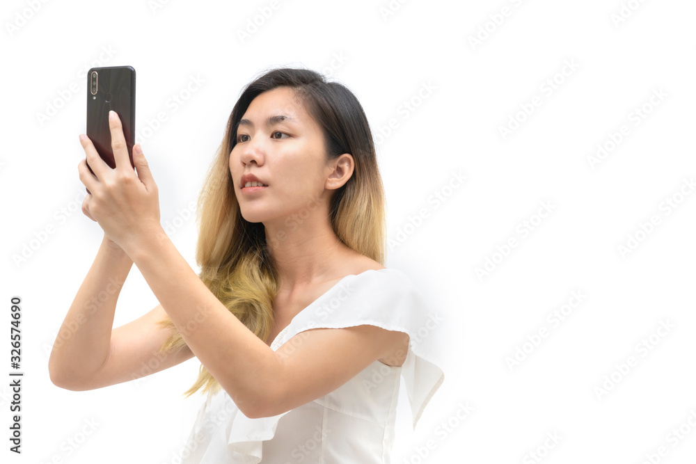 Asian women are using mobile phones. Asian women are using mobile phones.