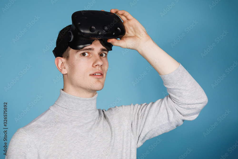 Guy plays with virtual reality glasses Guy plays with virtual reality glasses