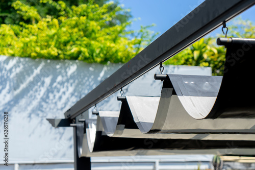 Retractable awning for outdoor interior design