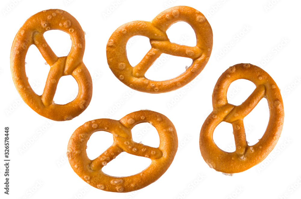 Pretzel with salt. Set or collection of baked pretzels with salt isolated on white background. Snacks for beer Pretzel with salt. Set or collection of baked pretzels with salt isolated on white background. Snacks for beer