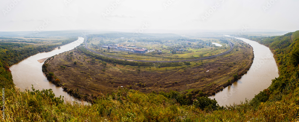 Panoramic view. Beautiful view of the valley of the Razdolnaya river and the concrete products plant from the Baranovsky volcano in the Primorsky Territory