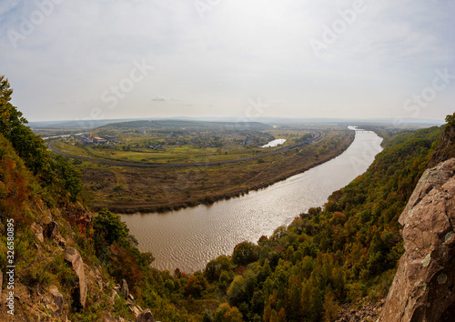 Panoramic view. Beautiful view of the valley of the Razdolnaya river and the concrete products plant from the Baranovsky volcano in the Primorsky Territory
