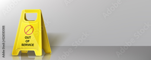Caution yellow warning sign with out of service inscription