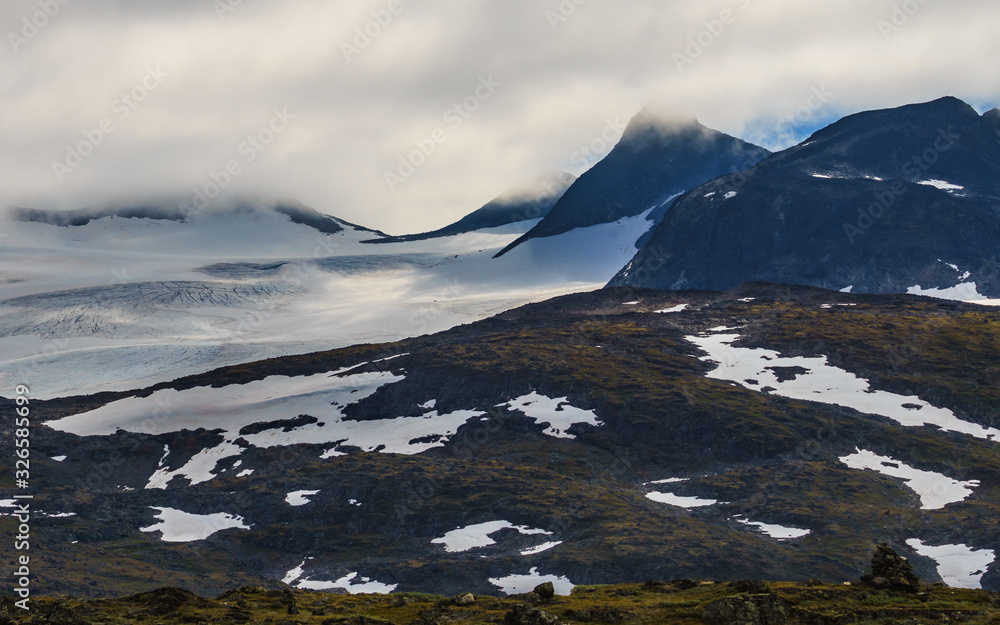 Fototapeta premium Mountains with ice glacier. Road Sognefjellet, Norway