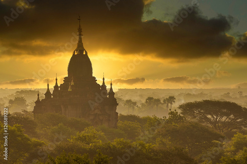 A large ancient pagoda which is Burmese architecture in the World Heritage Site in the morning of Bagan, Myanmar.