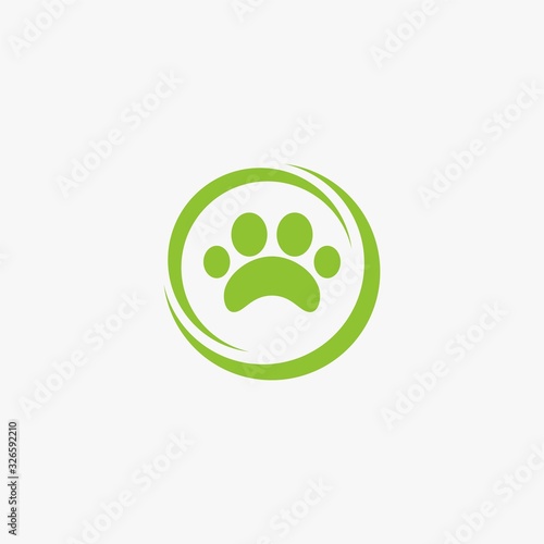 Green leaf logo design. Bio natural sign vector. Circle foot print icon design.