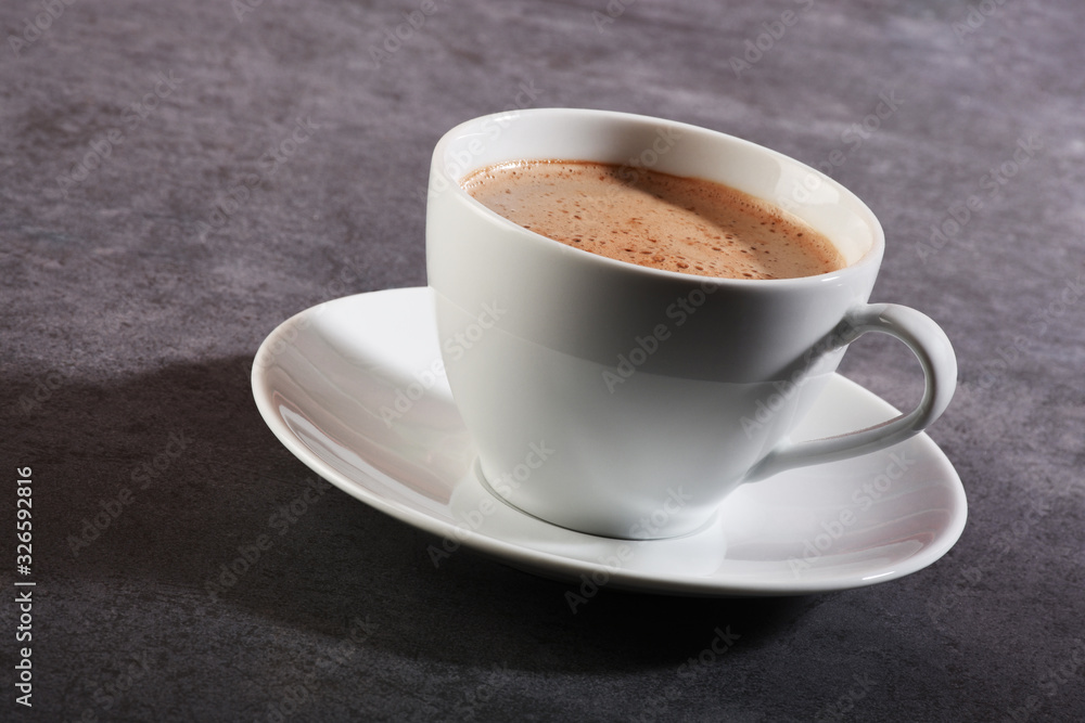 Cup of coffee on gray stone table Cup of coffee on gray stone table