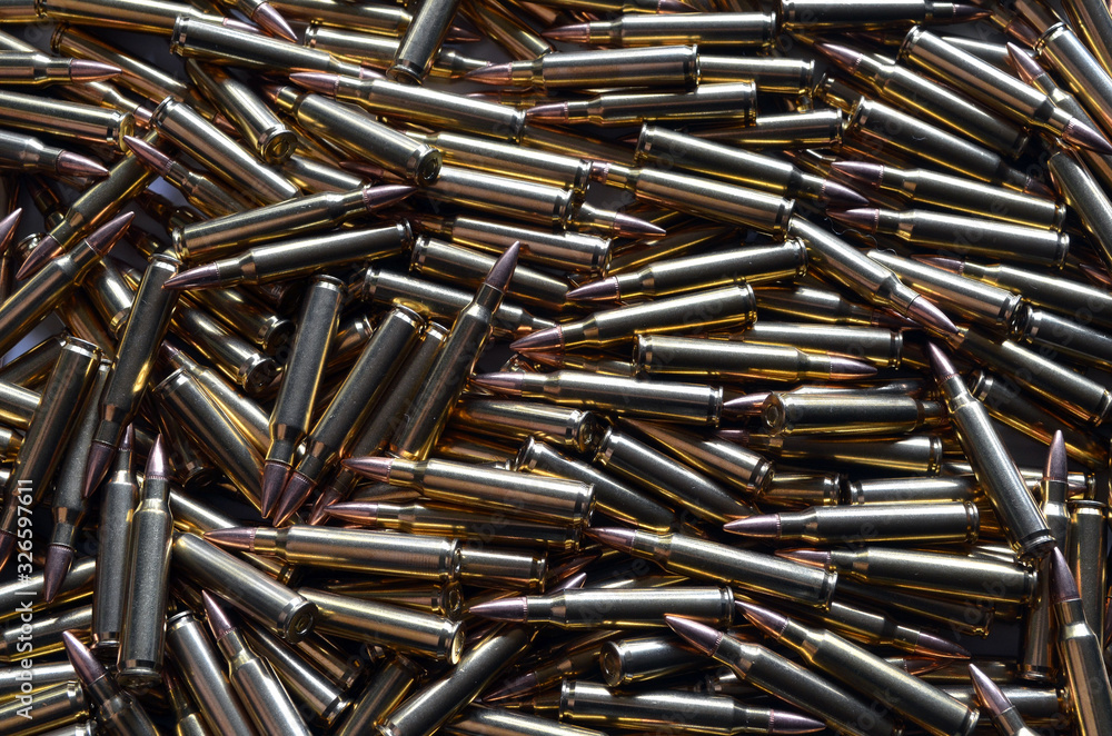 Assault rifle ammo 5.56 NATO for use background Assault rifle ammo 5.56 NATO for use background