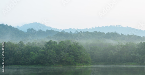 Fototapeta Naklejka Na Ścianę i Meble -  Beautiful nature and fog on the reservoir at Jetkod-Pongkonsao Natural Study in Saraburi Thailand	