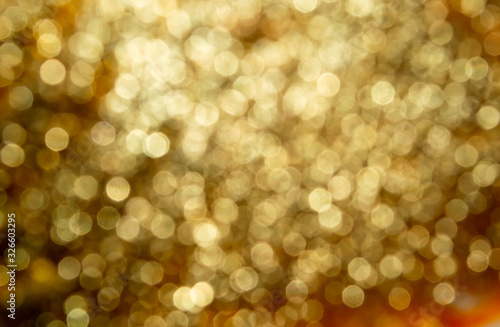 gold bokeh on black background