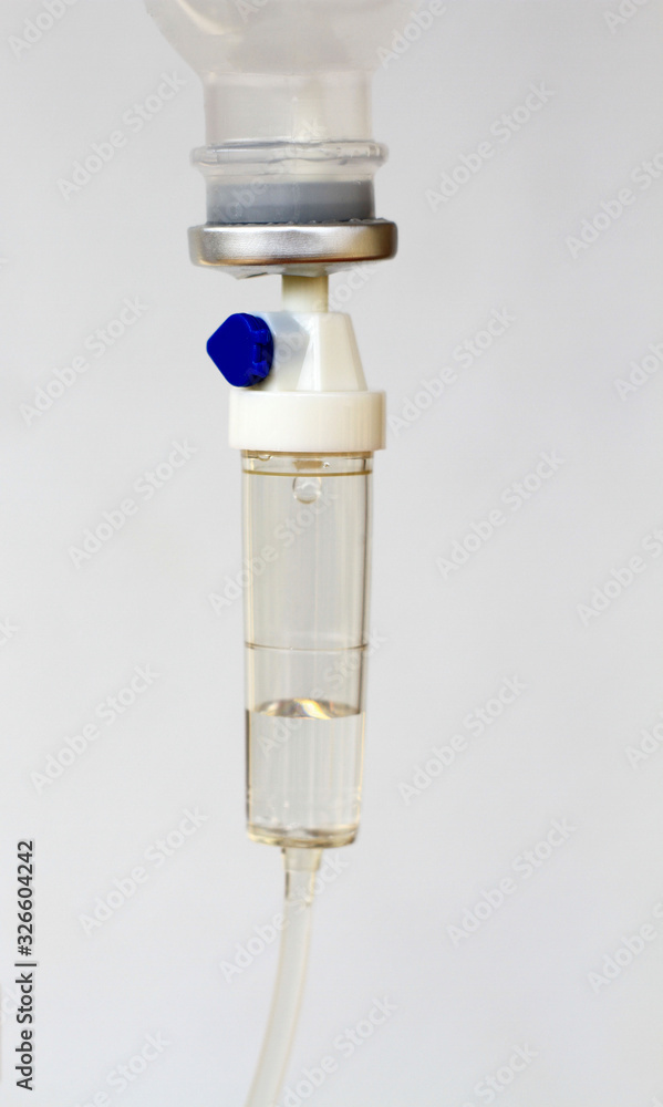 Set iv fluid intravenous drop saline drip hospital room. medical concept, treatment of diseases. Set iv fluid intravenous drop saline drip hospital room. medical concept, treatment of diseases.