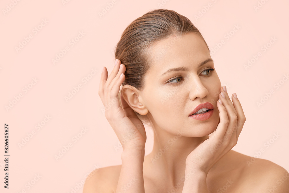 Beautiful young woman on color background. Concept of plastic surgery Beautiful young woman on color background. Concept of plastic surgery