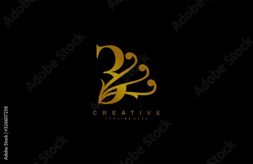 E Linked Abstract Flourish Gold Color Monogram Shape Vector Logo