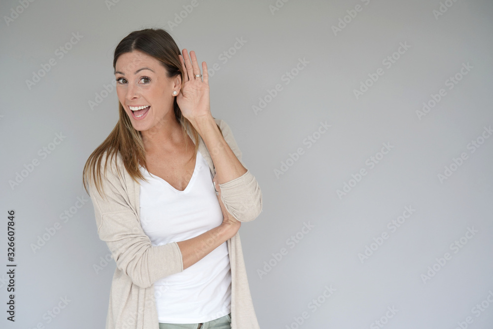 Portrait of beautiful and cheerful woman on grey background, isolated Portrait of beautiful and cheerful woman on grey background, isolated