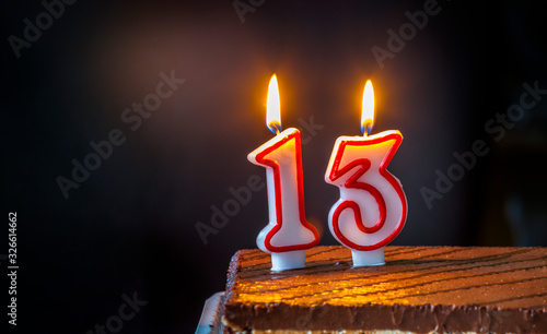 Photography Thirteenth Birthday cake with candles