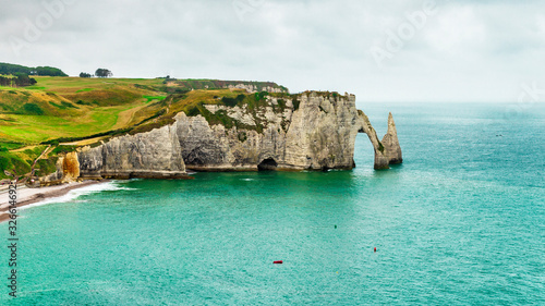 Panorama of natural chalk cliffs of Etretat photo