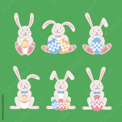 Easter rabbits. Easter cartoon bunny from front and back side on green backgr...