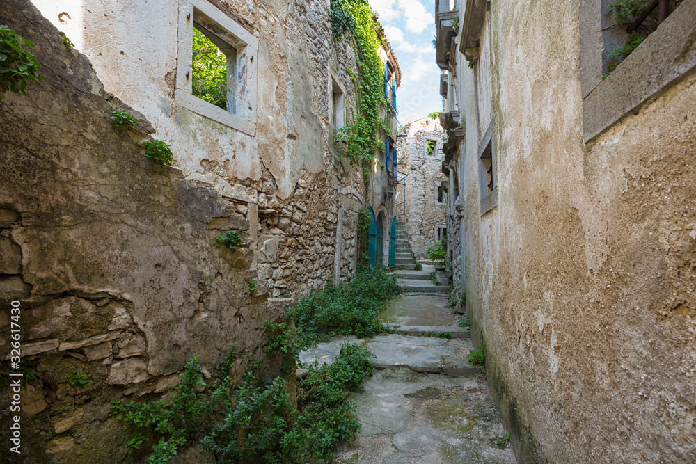 old abandoned houses in ancient town of Plomin, Croatia.