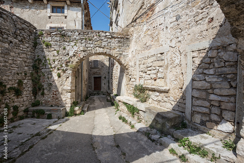 old abandoned houses in ancient town of Plomin, Croatia.