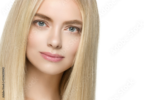 Smooth hair woman blonde long hairstyle natural blue eyes clean skin female portrait