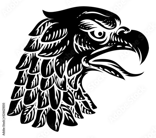 An eagle, falcon hawk or phoenix head face mascot in engraved style.
