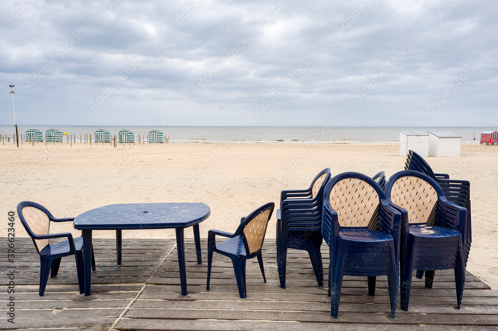 bath cabins and tables on the beach at De Panne in Belgium