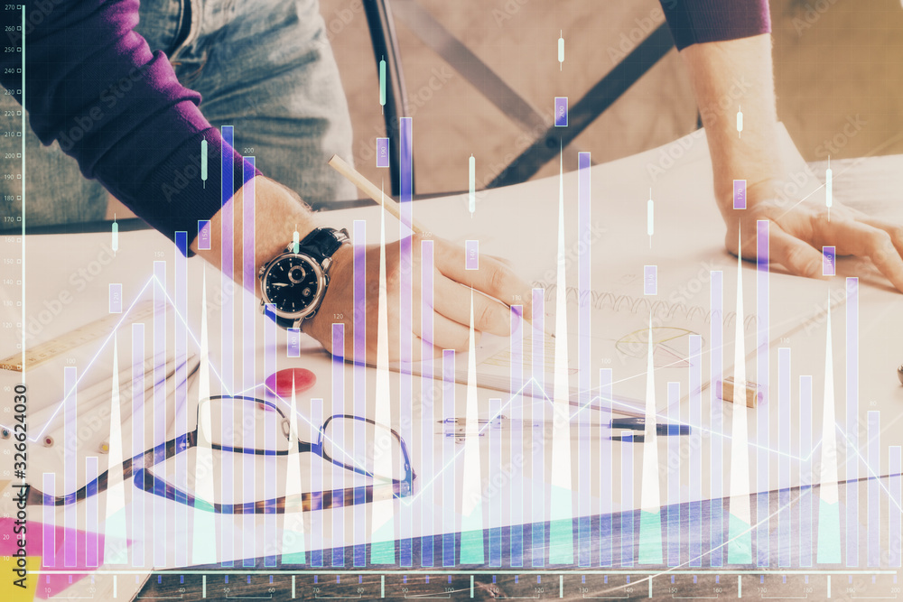 Multi exposure of man standing and planing investment with stock market forex chart.