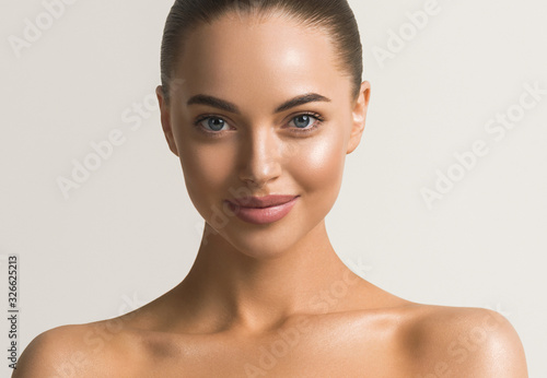 Beautiful woman face close up beauty make up natural healthy clean skin 