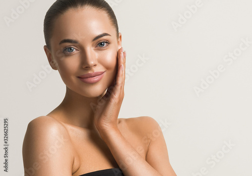 Beautiful woman face close up beauty make up natural healthy clean skin 