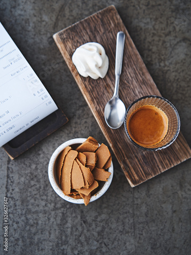 Brunost (brown cheese) and espresso shot photo