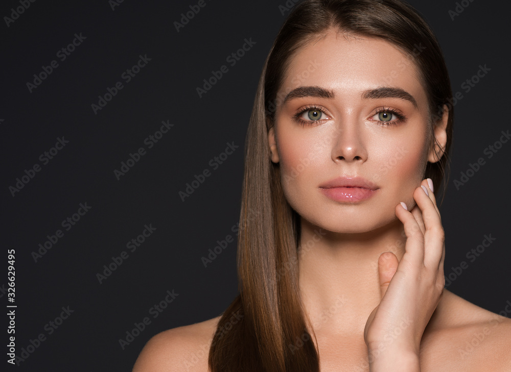 Beautiful woman natural make up long smooth healthy hair brunette cosmetic concept female beauty skin care over black background Beautiful woman natural make up long smooth healthy hair brunette cosmetic concept female beauty skin care over black background