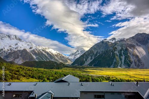 Bilde på lerret Panoramic mountain views on the top of the mountain are white snow in the summer