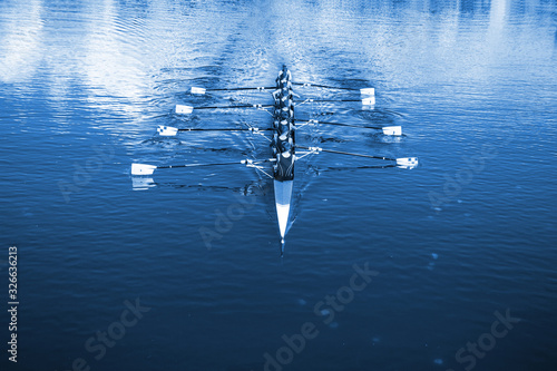Fotografie, Tablou Boat coxed eight Rowers rowing on the tranquil lake