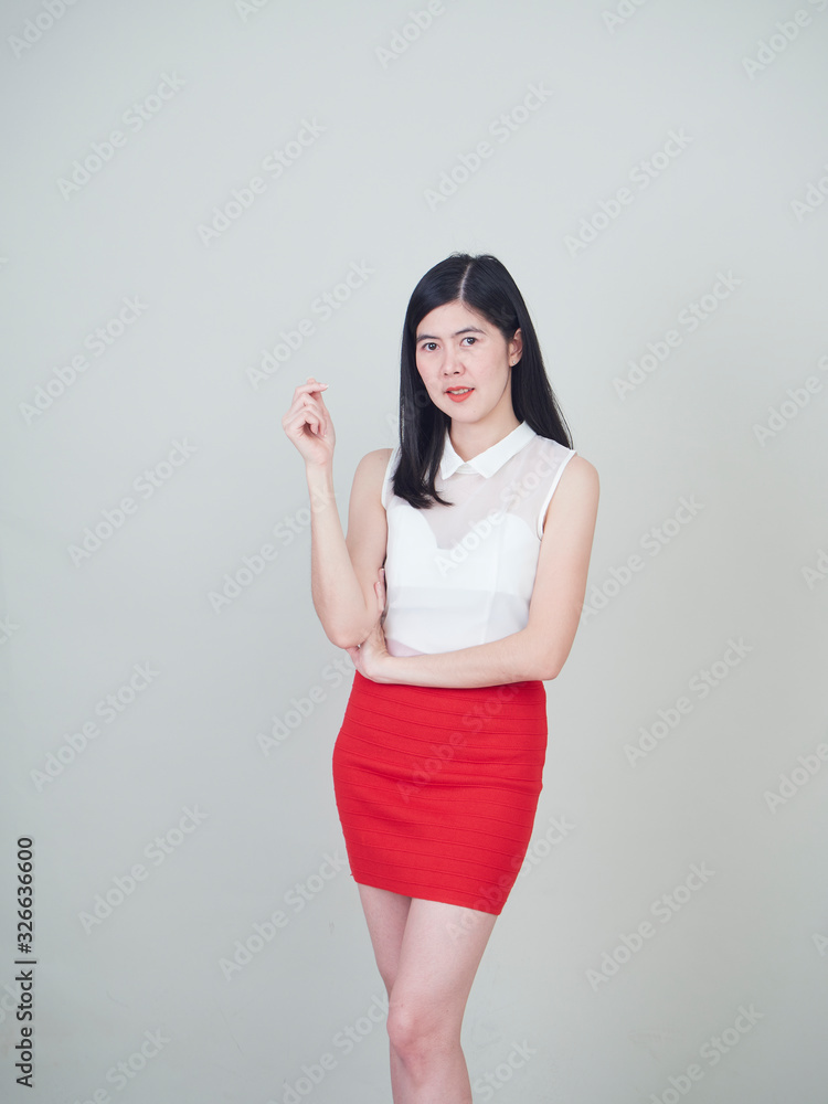 Cheerful woman while smiling at camera. Cheerful woman while smiling at camera.
