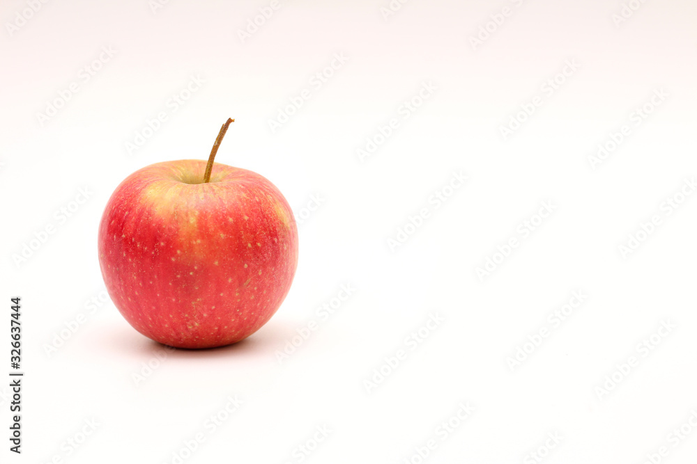 Isolated red-yellow apple on a white background. Isolated red-yellow apple on a white background.