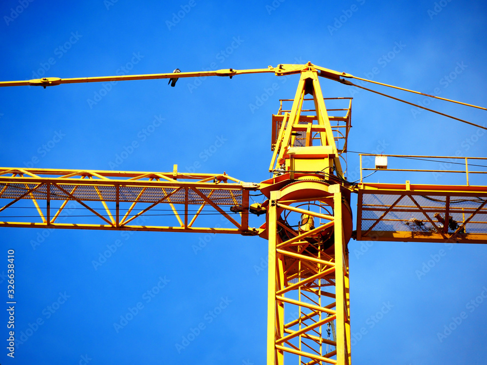 Crane. Self-erection crane near concrete building. Construction site. Crane. Self-erection crane near concrete building. Construction site.