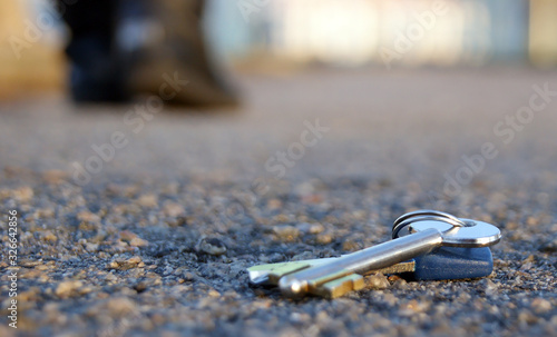 A man lose keys on the road. Losing keys concept. © iama_sing