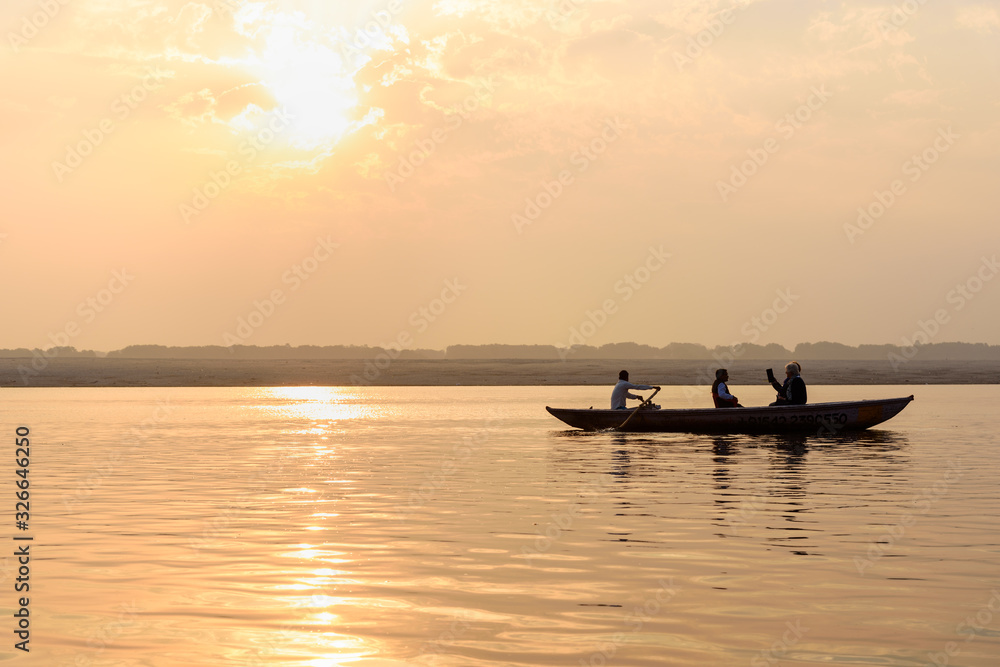 Boat on the river Ganga in sunrise. Varanasi. India