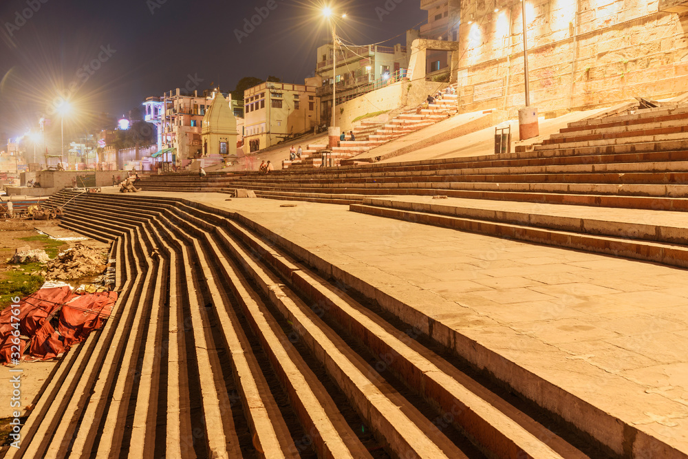 Fototapeta premium Colorful illumination of the Ghats in the night. Varanasi. India