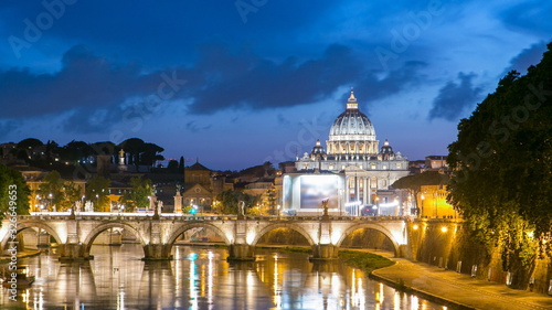 Rome, Italy: St. Peter's Basilica, Saint Angelo Bridge and Tiber River after the sunset day to night timelapse