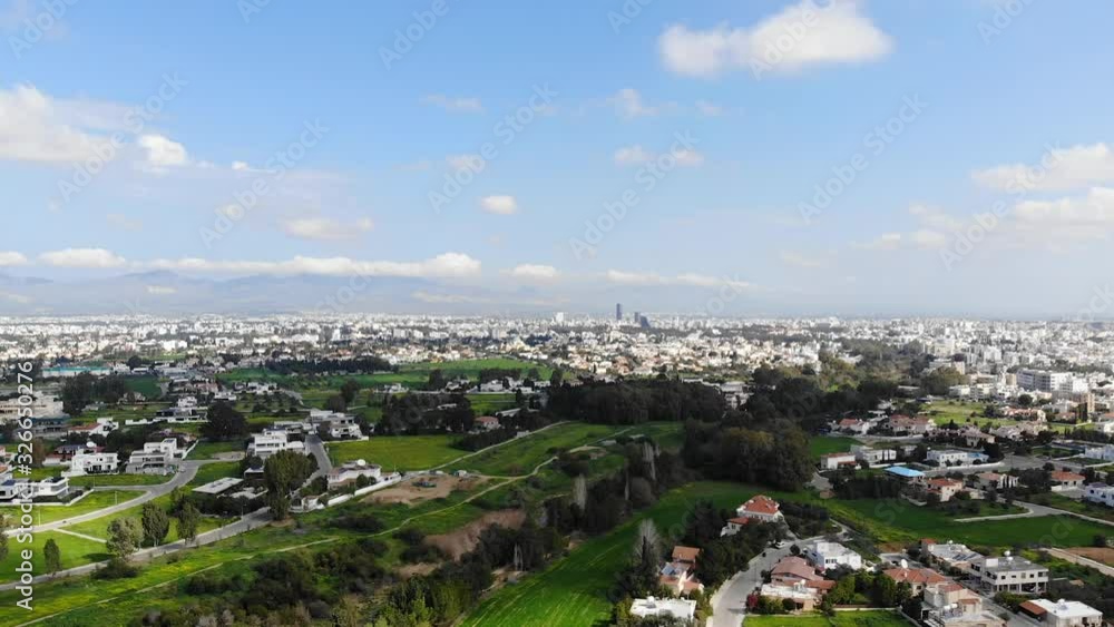Drone view of Nicosia capital city and green parks, Cyprus